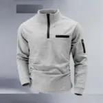 New men's athletic polo shirt, vintage striped design with half-zip closure, slim fit, stylish outdoor long-sleeved casual top.
